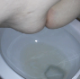One of our users records his large wife taking a sloppy, runny shit into a toilet. She spreads her ass cheeks to show the mess on her butt hole. Finished product shown in toilet bowl.